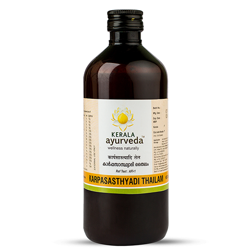 Front view of a dark brown glass bottle of Kerala Ayurveda Karpasasthyadi Thailam, with a white label featuring the product name in English and Malayalam script and the Kerala Ayurveda logo. – Kerala Ayurveda India