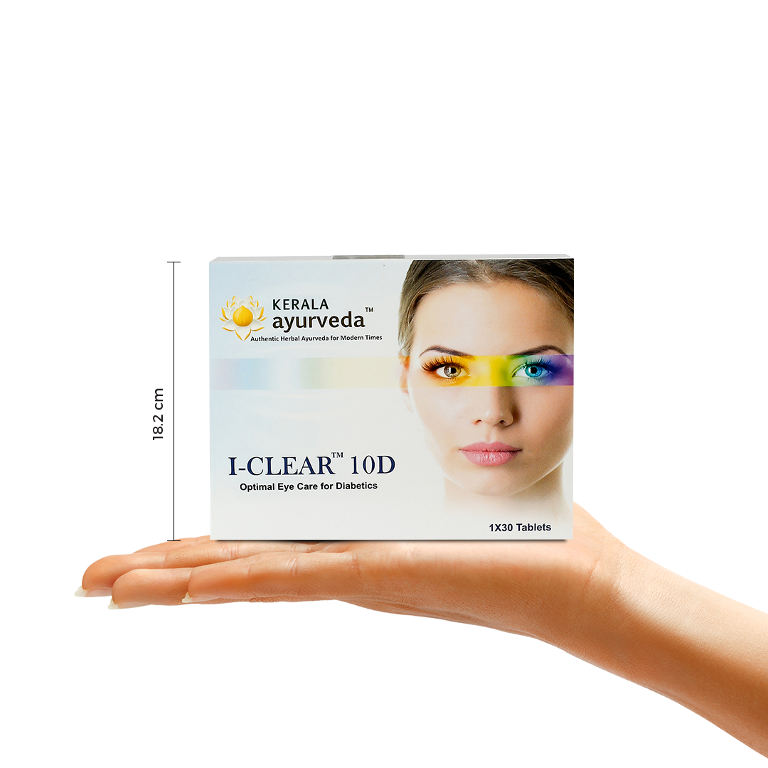 A hand holding the Kerala Ayurveda I-Clear 10D Tablets box, with a measurement indicator showing its height as 18.2 cm. The product name "Optimal Eye Care for Diabetics" is visible. – Kerala Ayurveda India