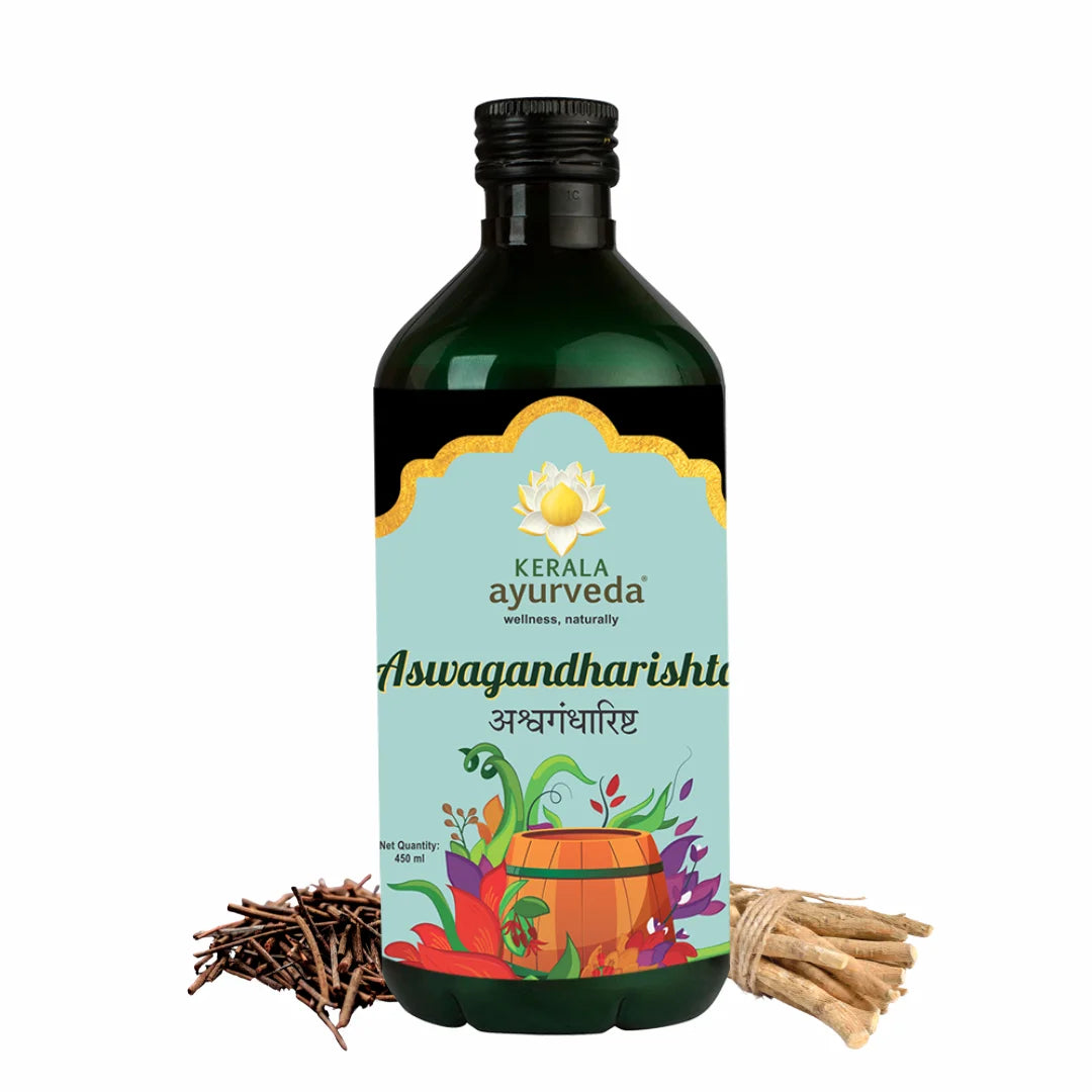 Front view of Kerala Ayurveda Aswagandharishta bottle with dried ashwagandha roots and other botanicals arranged around it, visually introducing the classic Ayurvedic strength tonic for stress relief – Kerala Ayurveda India