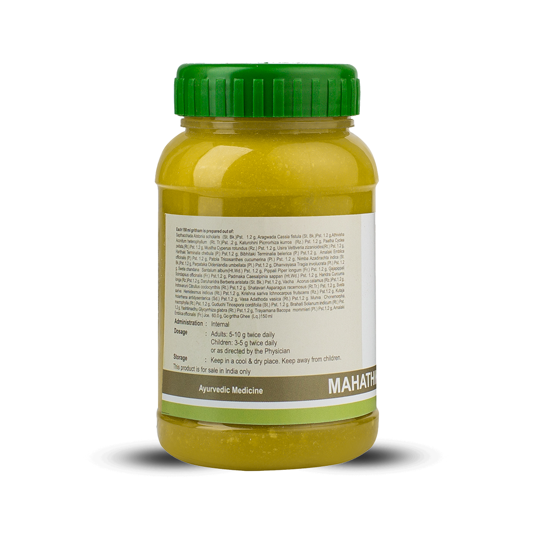 Side label showing detailed Sanskrit–botanical ingredient list plus internal dosage instructions for adults and children on the Mahathikthaka Ghritham jar.