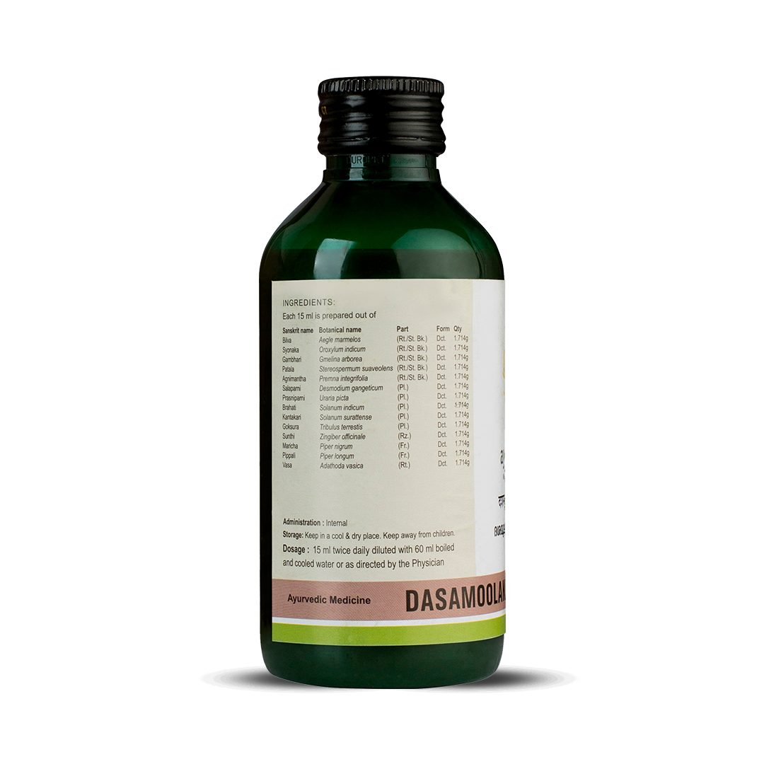 Side view of the dark green glass bottle of Kerala Ayurveda Dasamoolakaduthrayam Kwath, showing a detailed list of ingredients prepared per 15 ml, and administration, dosage (15 ml twice daily diluted with 60 ml water), and storage instructions. – Kerala Ayurveda India