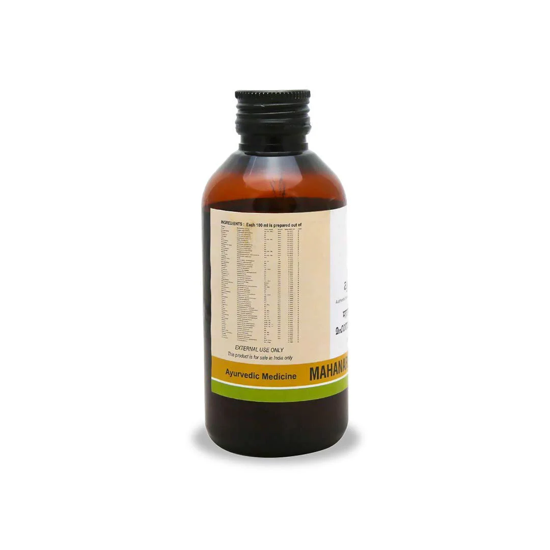 Side view of a 200ml dark brown glass bottle of Kerala Ayurveda Mahanarayana Thailam, showing a detailed list of ingredients prepared per 100 ml for this Ayurvedic medicine. – Kerala Ayurveda India