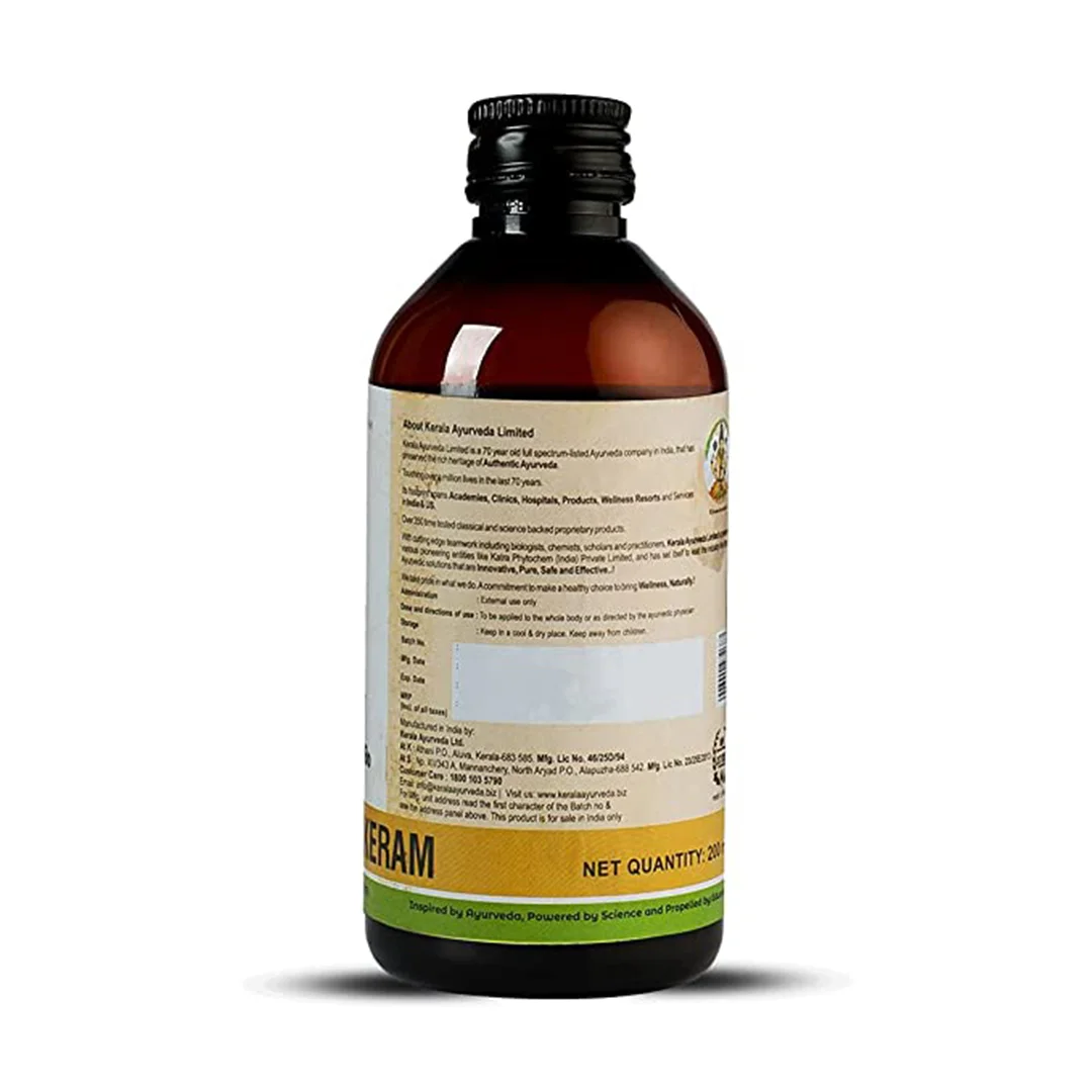 Back view of Nalpamaradi Keram 200 ml amber bottle displaying full ingredient and usage label – Kerala Ayurveda India