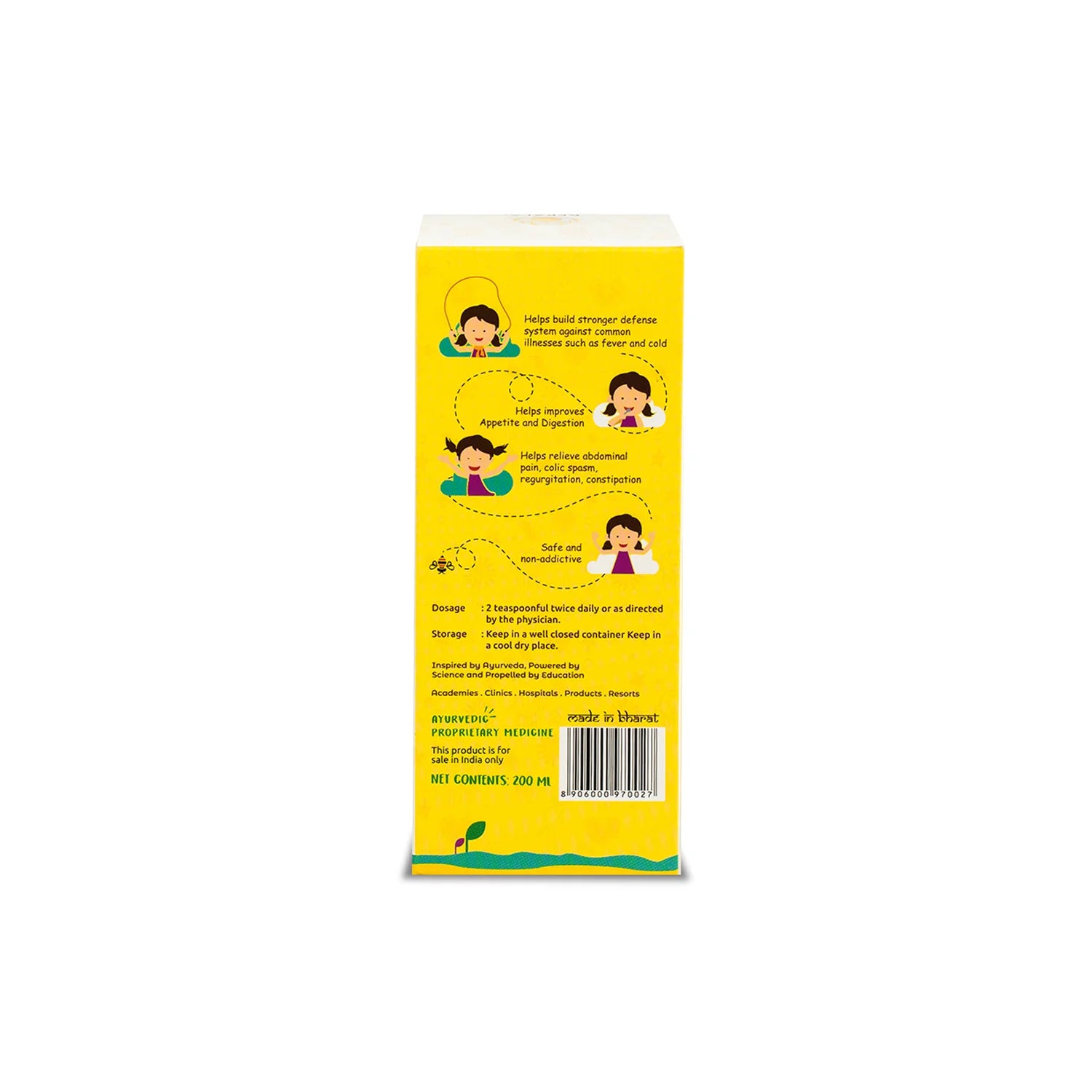 Yellow Balakalpam carton side panel with fun kid illustrations listing benefits (stronger immunity, better digestion, colic relief) plus dosage, storage and barcode – Kerala Ayurveda India